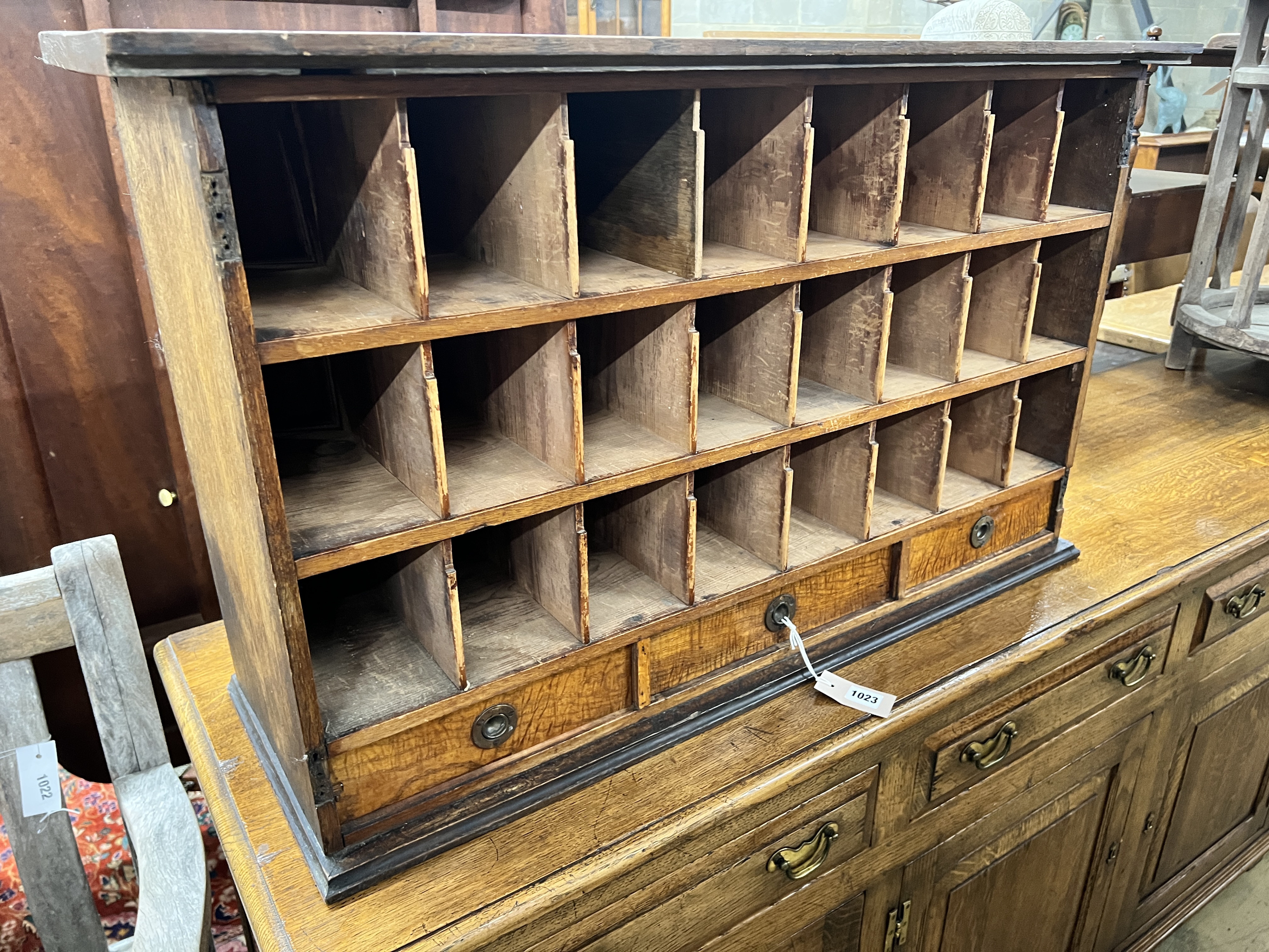 An early 20th century three drawer pigeonhole unit, length 94cm, depth 32cm, height 56cm